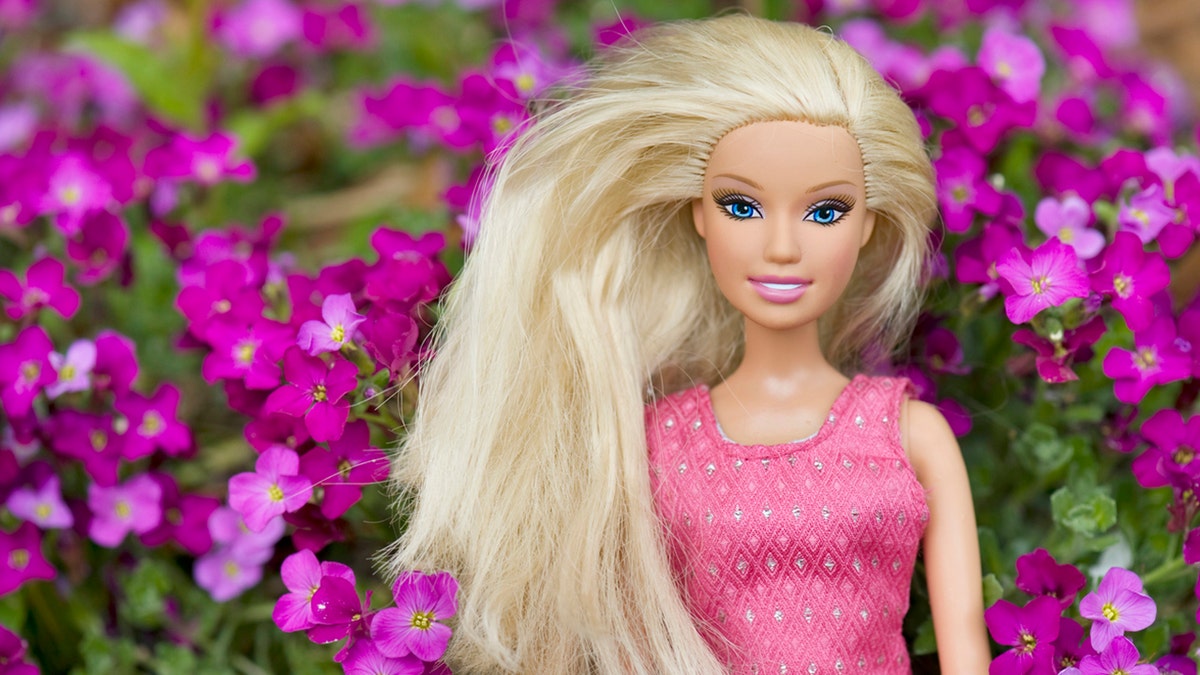 barbie doll in flowers